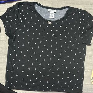 black shirt with little pink roses